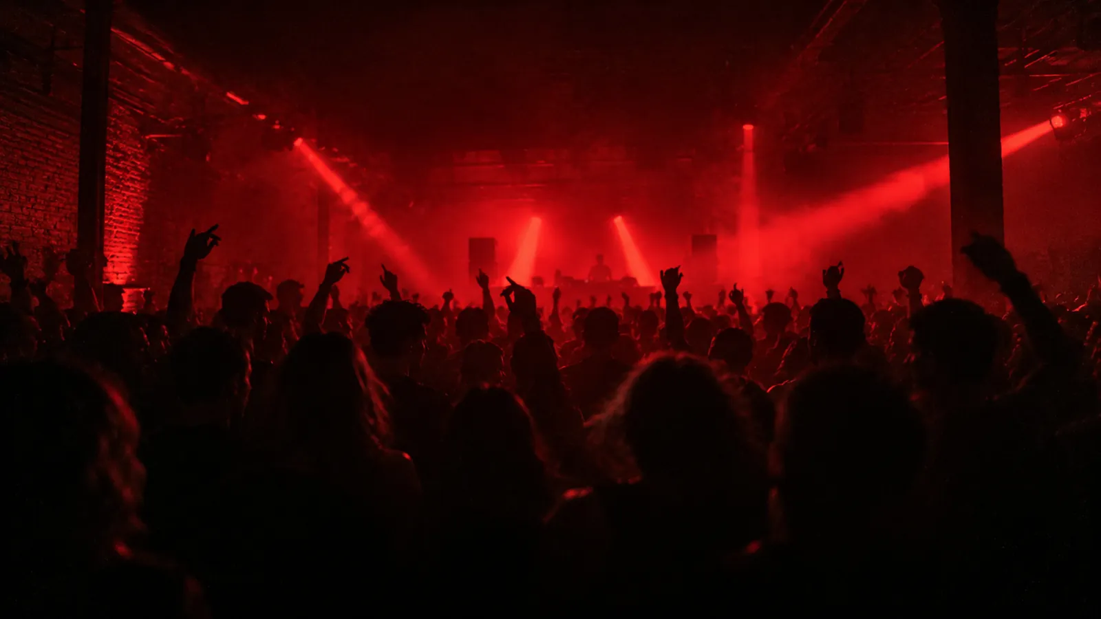Crowd under red beams
